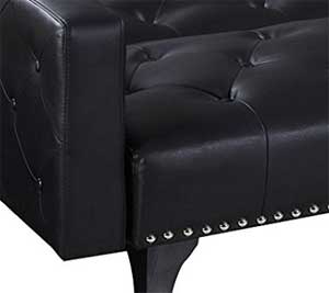 Close-Up Of Black Tufted Sofa Nailhead Trim and Tufted Upholstery